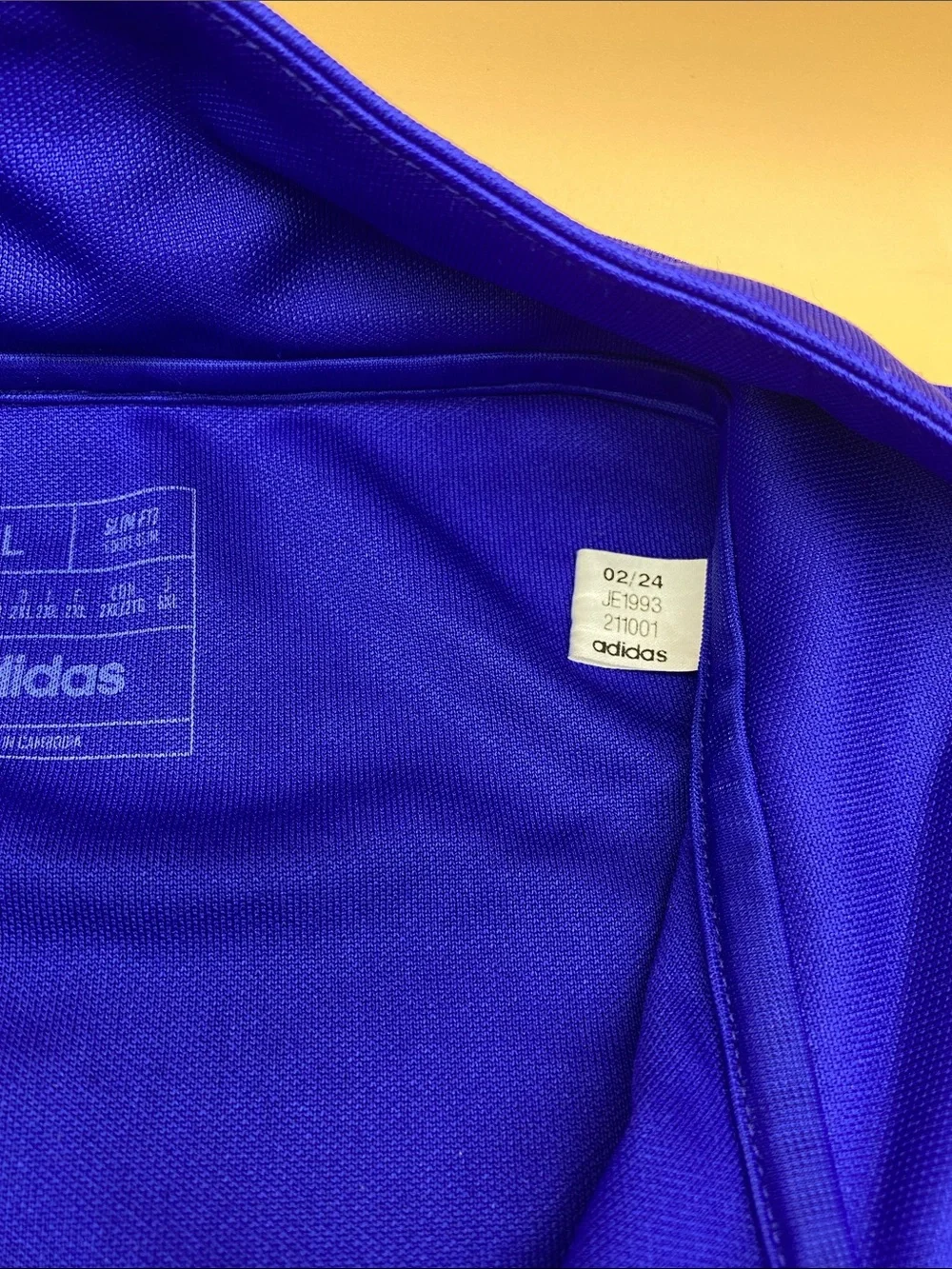 adidas Men’s Royal Blue Half-Zip Track Top with Orange Accents